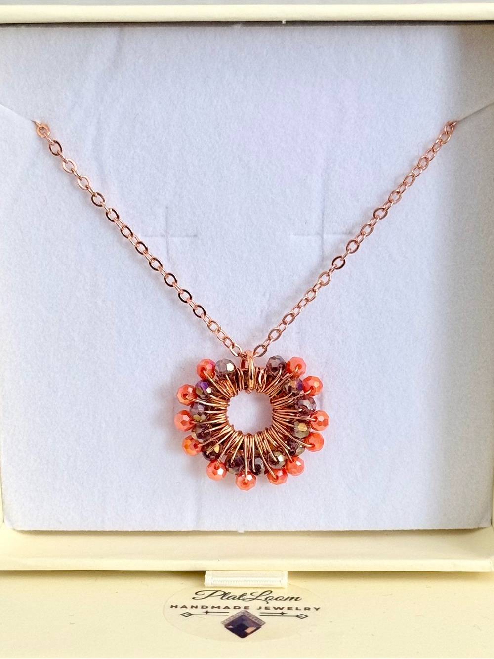 Circle Sunburst Pendant Necklace with Coral and Purple Beads Accents